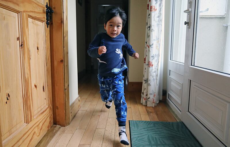An excited Darby runs through his house as he gets ready for his first day at national school. Photograph: Lorraine Teevan