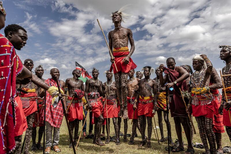 A group of Maasai men perform their traditional jumping dance during a Maasai cultural festival in Sekenani, in June 2023. Photograph: Luis Tato/AFP/Getty Images