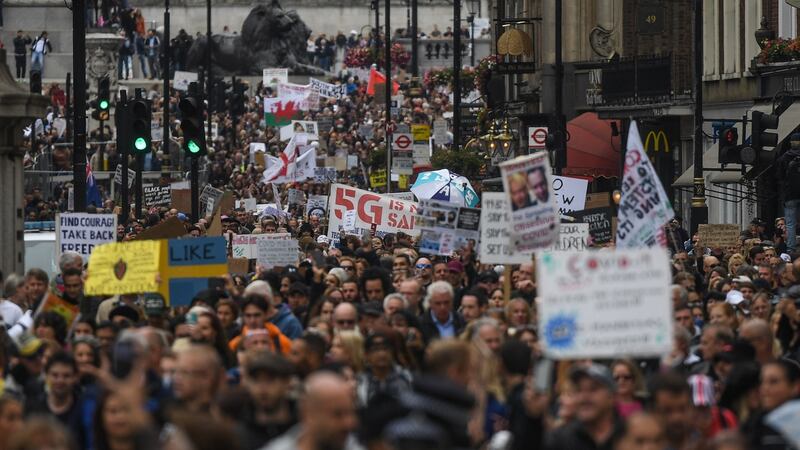 Anti-mask protesters participate in the Unite for Freedom protest in Trafalgar Square. Photograph:  Peter Summers/Getty Images