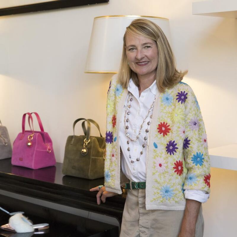 Elyce Arons, the chief executive of the Frances Valentine label, wears a cardigan that echoes one from Kate Spade’s closet. Photograph: Stefania Curto/New York Times