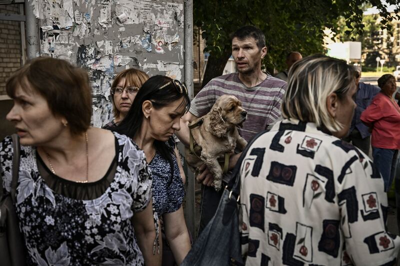 Civilians are evacuated from the city of Sloviansk in the eastern Ukraine region of Donbas on Thursday