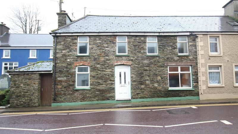 This charming property at 20 Main Street, Drimoleague, Co Cork has exposed old stone walls and overhead beams