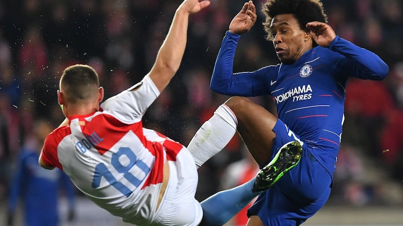 Willian challenges with Slavia Prague’s Jan Boril during Chelsea’s 1-0 win. Photograph: Joe Klamar/AFP/Getty