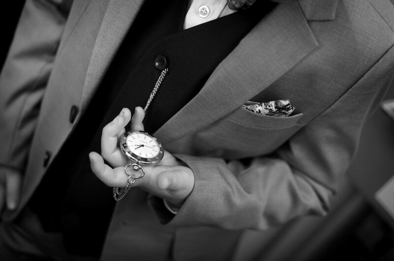  Bradley Cooney-Roche (8) tries out his new pocket watch at the fitting. Photo: Bryan O’Brien 