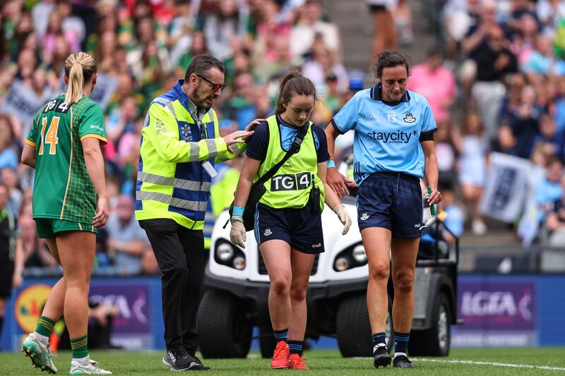 Dublin's Hannah Tyrrell leaves the field due to an injury. Photograph: Ben Brady/Inpho