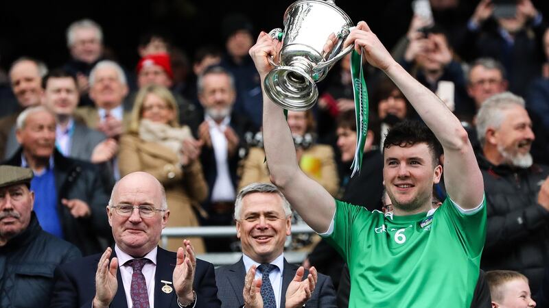 Declan Hannon with the trophy after Limerick beat Waterford in the Division One final. Photograph: Ryan Byrne/Inpho