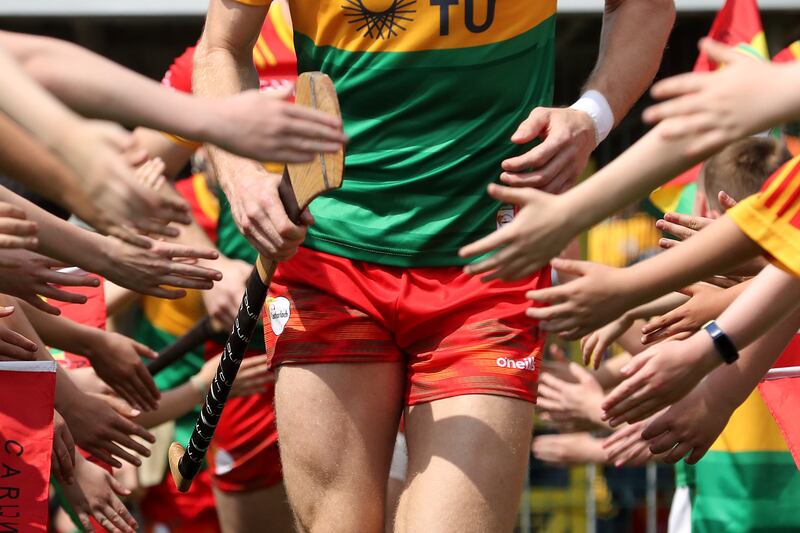 Carlow players make their way onto the field at Cullen Park on Sunday. Photograph: Bryan Keane/Inpho