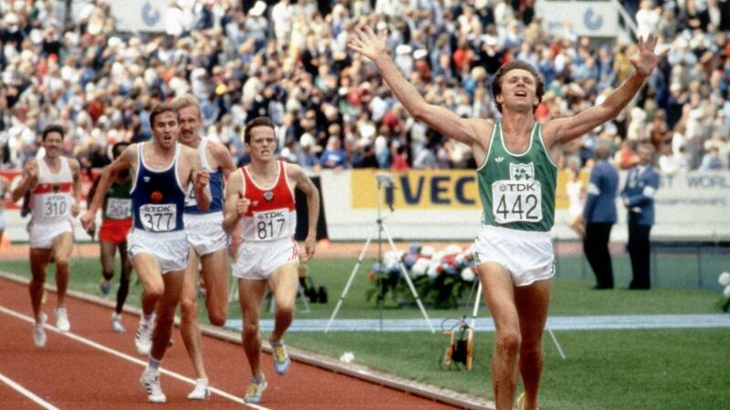 Eamonn Coghlan of Ireland raises his arms in the air as he crosses the line to win the 5,000 metres  during the 1983 World Championships in Helsinki. Photograph: Steve Powell/Getty Images