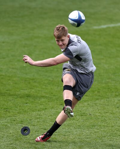 Fin Smith practices his kicking during the Northampton Saints training session held at the cinch Stadium at Franklin's Gardens. Photograph: David Rogers/Getty