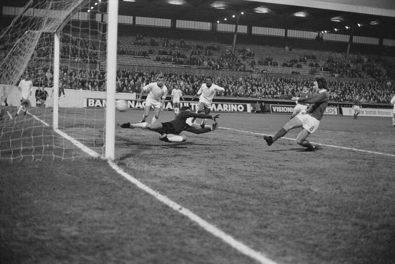 Martin O'Neill opens the scoring for Northern Ireland in a 1-1 draw against Portugal in a World Cup qualifier in Coventry, March 1973. Photograph: Robert Stiggins/Daily Express/Hulton Archive/Getty Images