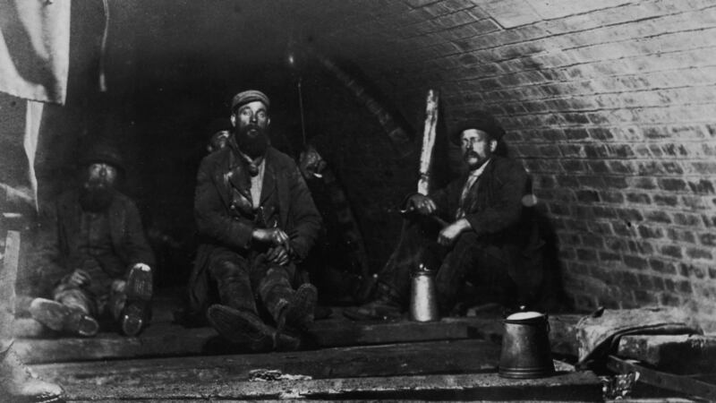 Navvies having a dinner break c1890  in a culvert during work on the Hury Reservoir dam in Yorkshire. Photograph:  Hulton Archive/Getty Images