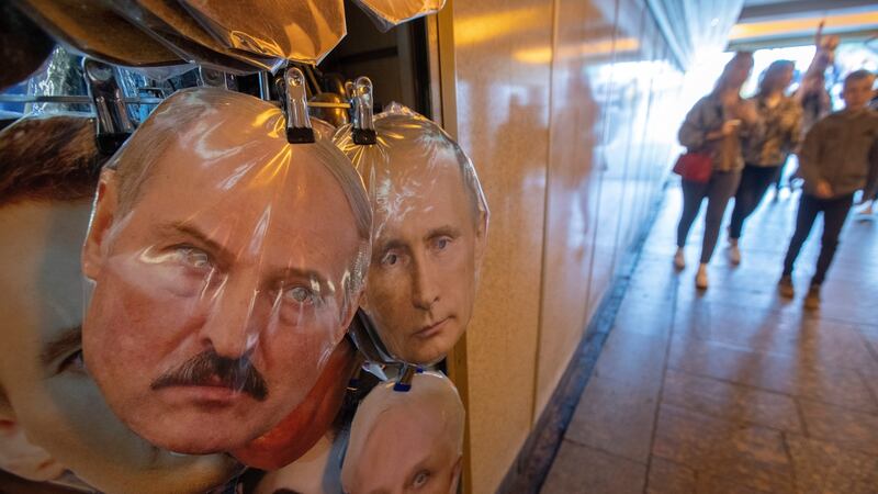 Masks of Belarus president Alexander Lukashenko (L) and Russian president Vladimir Putin displays on the street souvenir market in St. Petersburg, Russia on Saturday. Photograph: Anatoly Maltsev/EPA