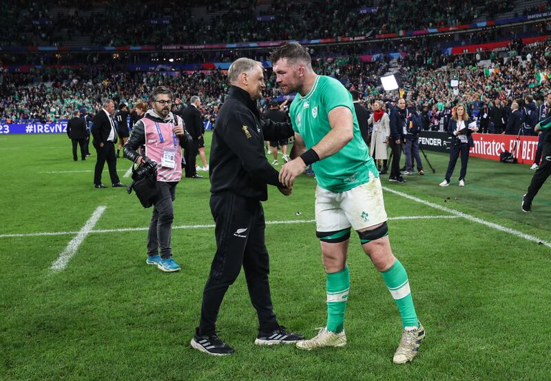 Ireland’s Peter O’Mahony with Joe Schmidt of New Zealand after the game. Photograph: Dan Sheridan/Inpho 