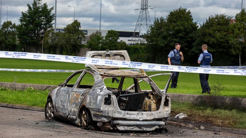 A burnt out car on Monksfield Lawns, Clondalkin, Dublin. Photograph: Tom Honan