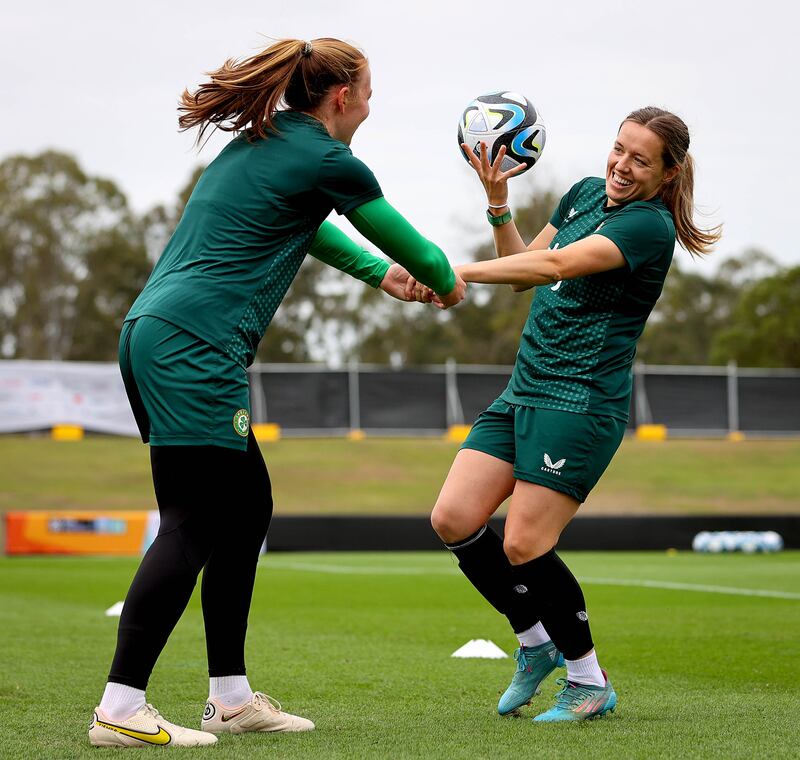 Harriet Scott and Ireland team-mate Courtney Brosnan at a training session in Brisbane during the Women's World Cup. Photograph: Ryan Byrne/INPHO