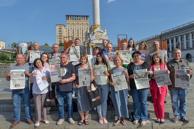 Editors of frontline Ukrainian local newspapers gathered on Kyiv's Maidan square with copies of their publications in June 2023. Photograph: Andriy Nesterenko, NUJ of Ukraine
