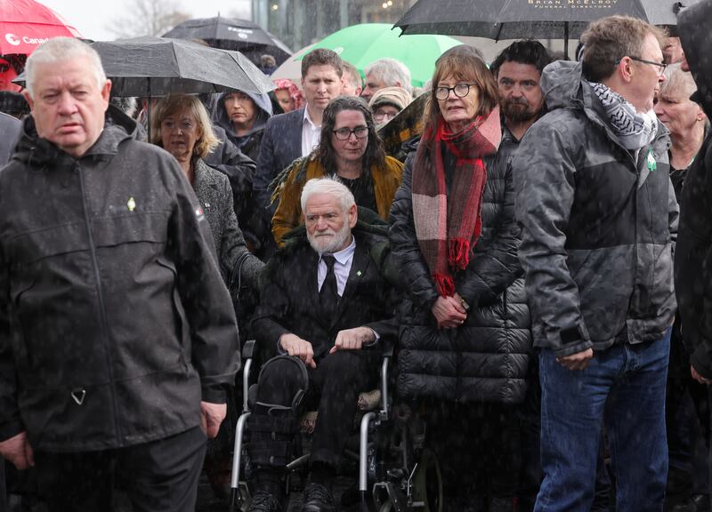 Jim Monaghan (wheelchair), one of the Colombia Three and Rose Dugdale's partner; to the right, Marion Coyle, former member of the IRA who was involved in the kidnaping of industrialist Tiede Herrema, and Ruairí Gallagher (back right), son of Rose Dugdale, at her funeral. Photograph: Alan Betson

