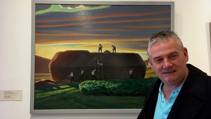 Kevin Magee with one of Rockwell Kent’s Irish paintings in Ar Lorg Annie