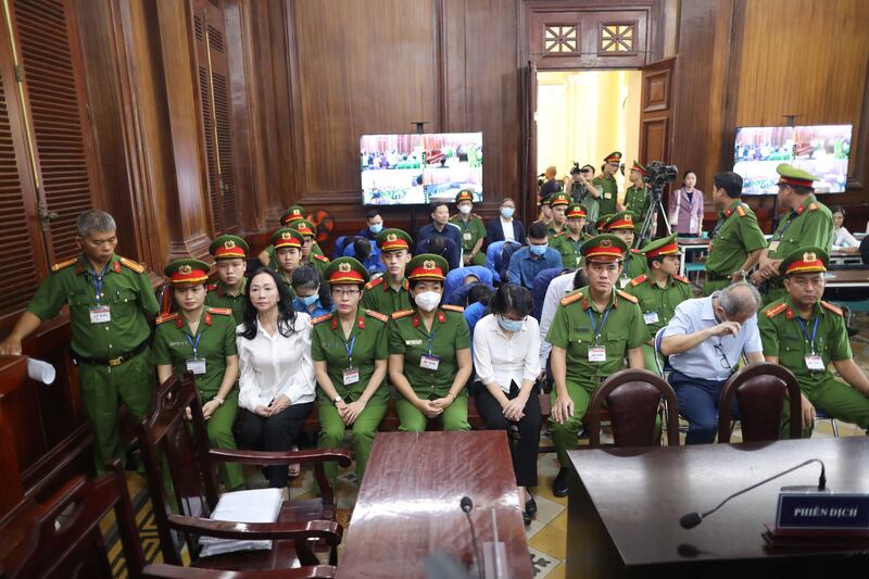 Vietnamese property tycoon Truong My Lan (third from left at front)  in court in Ho Chi Minh City, Vietnam. Photograph: AFP/Getty
