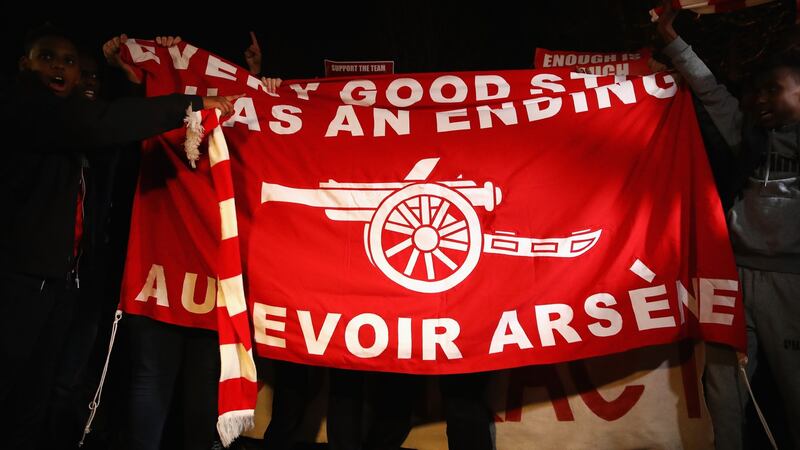 Around 200 fans held up banners. Photo: Clive Mason/Getty Images