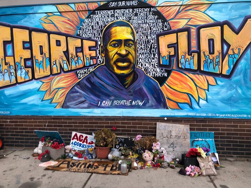 Wall murals and pavement art mark the site where George Floyd was killed during his arrest on May 25th, 2020