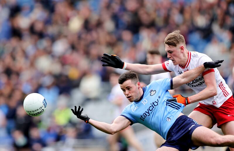 Dublin's Ross McGarry and Lorcan McGarrity of Tyrone in the Allianz Football League. Photograph: Tom Maher/Inpho