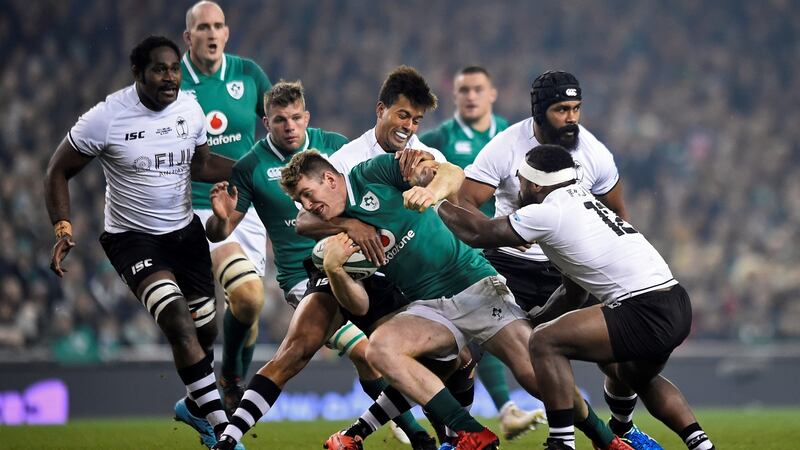 Farrell in action against Fiji. His  desire to take ball to the gainline, get the pass away and accept the hammering makes him a valued member of any rugby squad. Photograph: Clodagh Kilcoyne/Reuters
