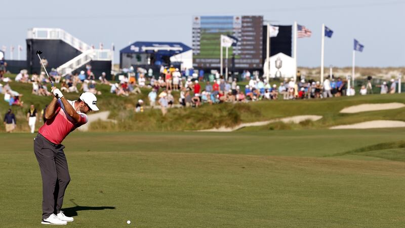 Corey Conners hits from the fairway on the 18th hole. Photo: Erik S. Lesser/EPA