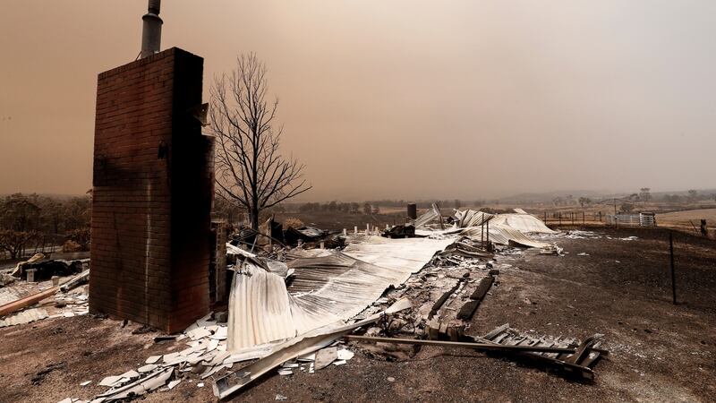 Debris of houses destroyed by fires in Sarsfield, Australia, about 200km west of Mallacoota. Photograph: Darrian Traynor/Getty Images
