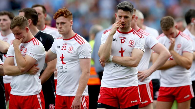 Despondent Tyrone captain Mattie Donnelly and his fellow players following the All-Ireland final defeat to Dublin at Croke Park.  Photograph: James Crombie/Inpho