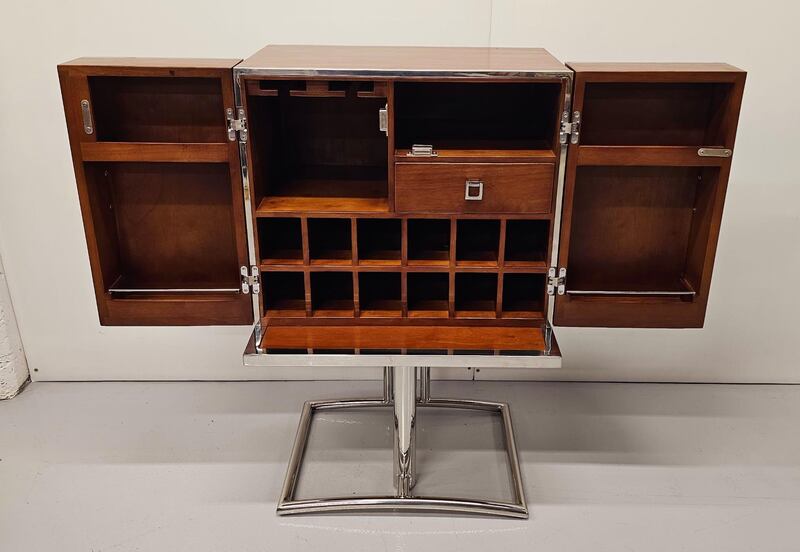 A walnut and chome home bar, €1,500-€2,500. (Victor Mee)