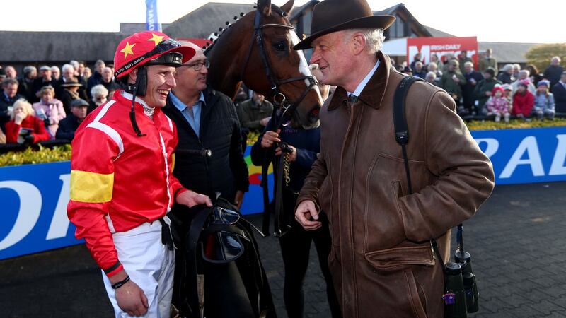 Jockey Paul Townend celebrates with trainer Willie Mullins after  Patricks Parkwon the Guinness Handicap Steeplechase at Pinchestown. Photograph: James Crombie/Inpho