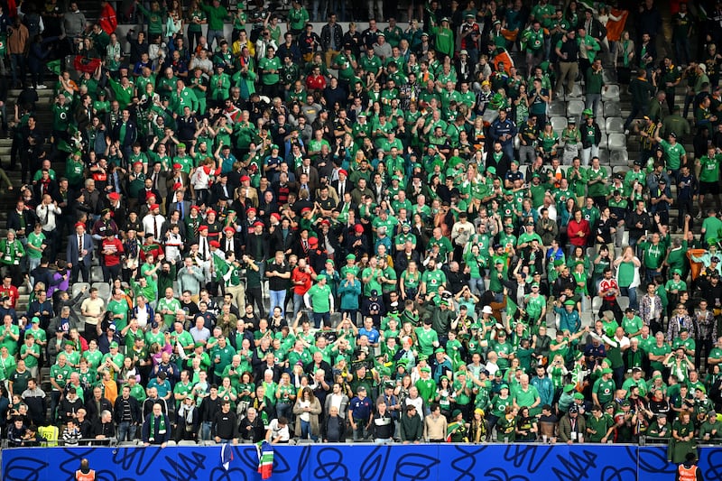 Ireland fans celebrating after defeating South Africa at Stade de France on Saturday. Photograph: Matthias Hangst/Getty Images