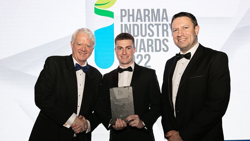 Matt Moran, Director, BioPharmaChem Ireland, presents the Responsible Care Award 2022 to Cian O'Reilly and Gerard Shannon, Pfizer Grangecastle.