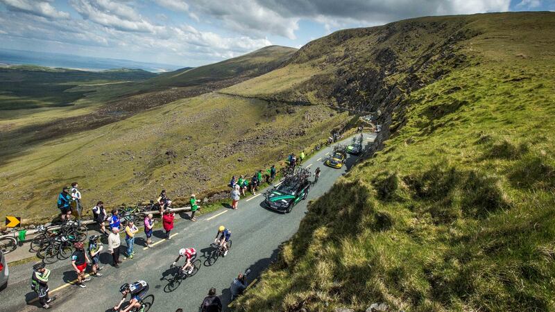 The chasing bunch climb the Conor Pass on stage 3 of the An Post Rás in 2016. Photograph: Morgan Treacy/Inpho