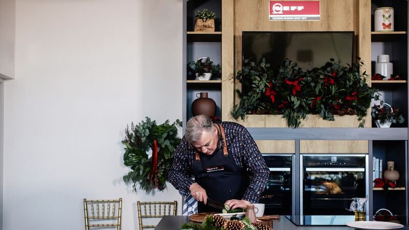 Derry preps his accompaniments in the Neff Kitchen
