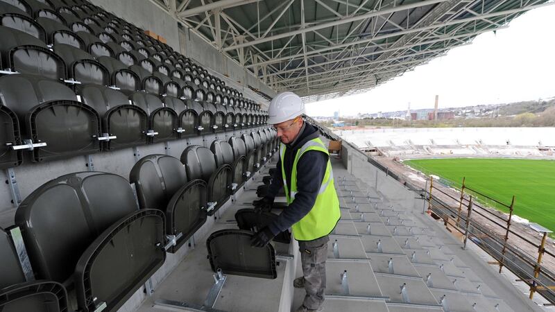 Darren Wright of Link Seating working on installing the new spectator seating in the south stand during the Pairc Uí Chaoimh redevelopment. Picture: Denis Minihane