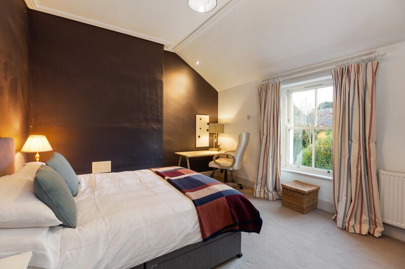 The first floor has four bedrooms and the family bathroom.