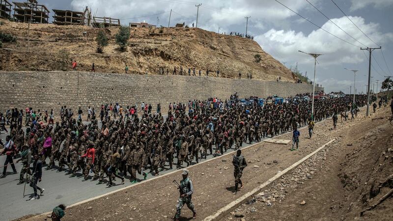 Tigray Defence Forces fighters escort thousands of captured Ethiopian government soldiers on Friday, July 2nd, as they march into Mekelle. Photograph: Finbarr O’Reilly/New York Times