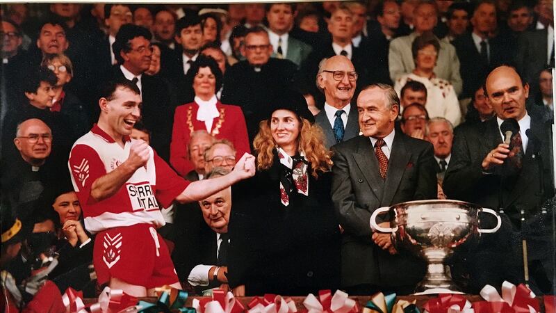 Derry’s Henry Downey gets ready to lift the Sam Maguire after Derry’s All-Ireland win in 1993. Photograph: Oliver McVeigh