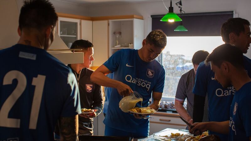 Players from the team G-44 dine on reindeer after claiming a place in the final. Photograph: Kieran Dodds/New York Times