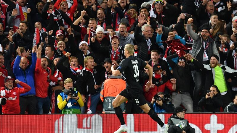 Salzburg’s Norwegian forward Erling Braut Haaland celebrates after scoring their third goal during the  Champions league Group E  match against Liverpool at Anfield. Photograph: Paul Ellis/AFP via Getty Images