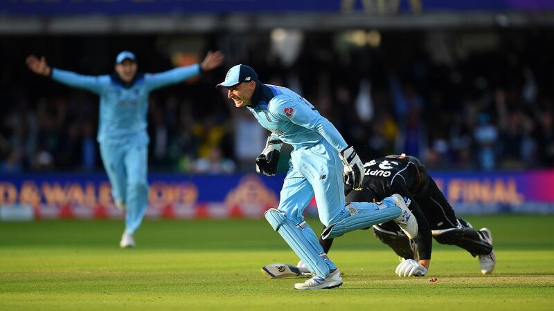 Jos Buttler celebrates after running out Martin Guptill to secure Cricket World Cup victory for England. Photograph: Clive Mason/Getty