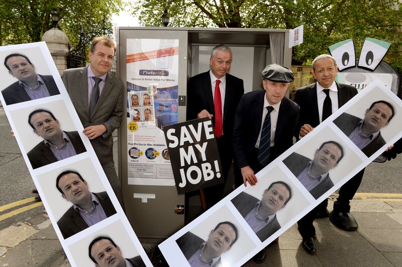 Kyran O'Kelly of Fuji Ireland, Tadhg Foley of Photo Me, Independent TD Michael Healy Rae and Olivier Gimpel of Photo Me in 2013 calling on then minister for transport Leo Varadkar to meet with them over the production of ID photos for driving licences. Photograph: David Sleator