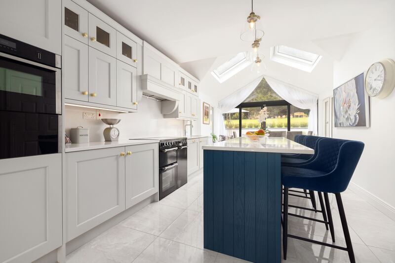 The De Barra kitchen features a Quooker tap, a Neff combi-oven  and an island unit with seating. Photograph: Andrew Nolan Photography