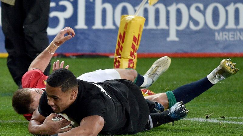 New Zealand’s inside centre Ngani Laumape scores the first try .  Getty Images