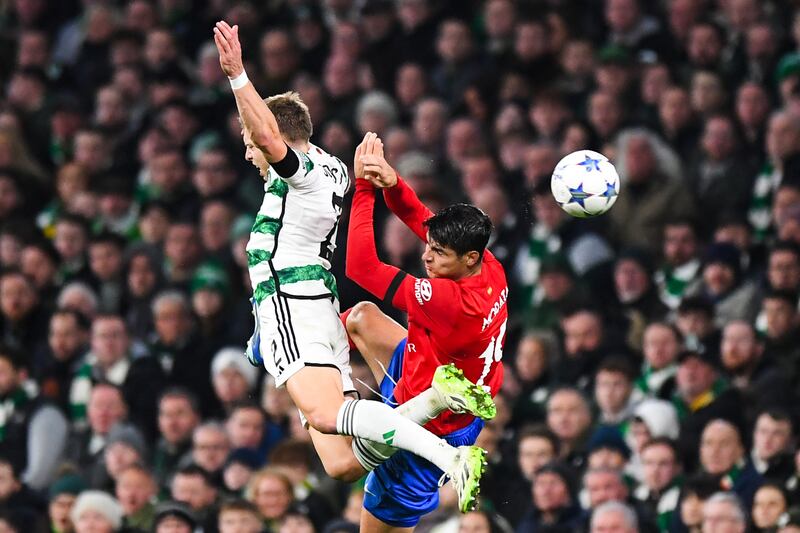 Celtic's Alistair Johnston fighting for the ball with Atletico Madrid's  Alvaro Morata during a Champions League group E match at Celtic Park,  Glasgow, on October 25th, 2023. Photograph: Andy Buchanan via Getty Images