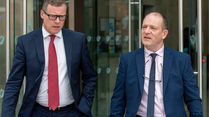 Kenneth Delcassian (right), brother-in-law of murdered Louth woman, Irene White, leaving court on Monday with his solicitor, Kevin Winters, after  Niall Power was sentenced to life for murder. Photograph: Collins Courts