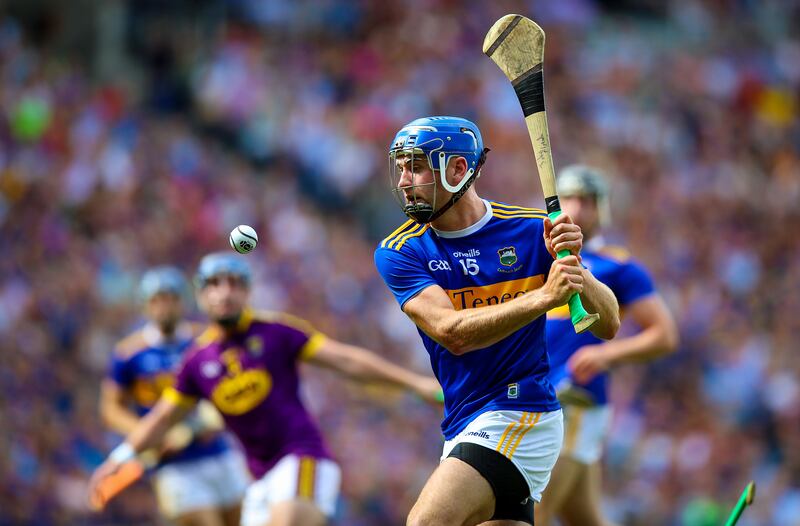 John McGrath doing his thing for Tipperary in 2019. Photograph: Tommy Dickson/Inpho