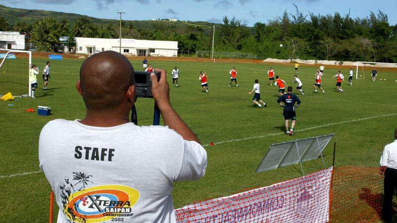 Locals come out to see the Irish team train in Saipan on May 20th, 2002. Photograph: Andrew Paton/Inpho